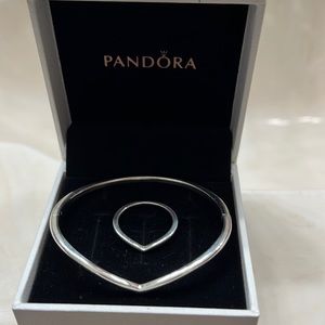 Pandora bracelet and ring.